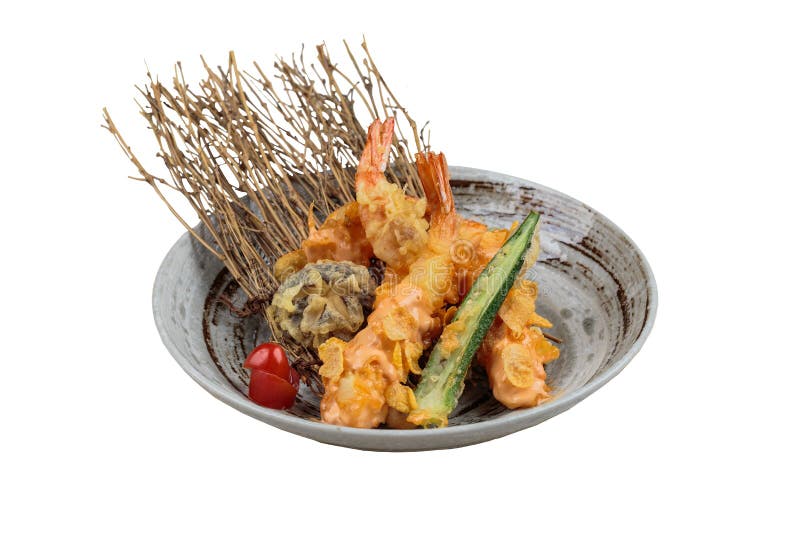 Isolated Shrimp and shiitake tempura with chilli served in ink painted round stone plate stock photography